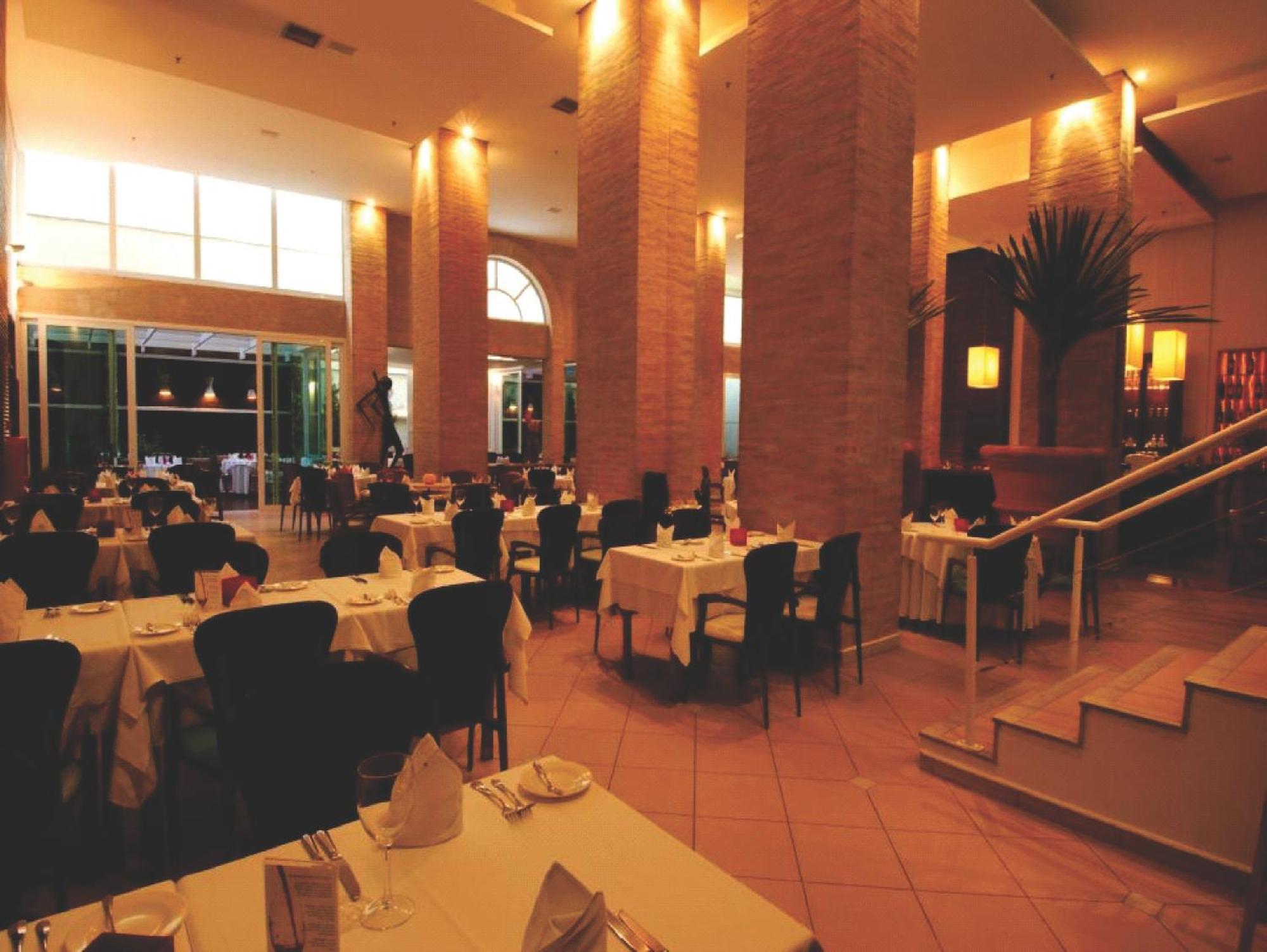 坎皮纳斯维多利亚概念酒店 餐厅 照片